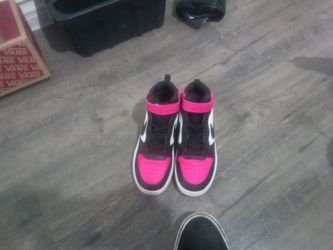 Pink and black Nike size 2y