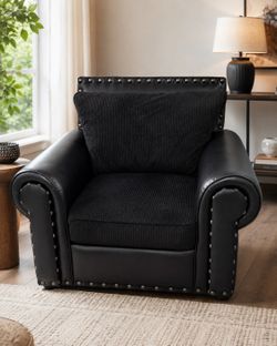 OVERSIZED BLACK ARM CHAIR – $175
