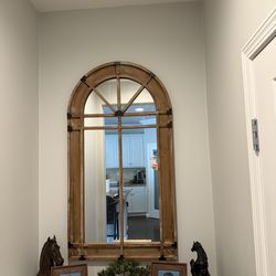 Mirror in a wood frame