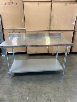 New stainless work tables with backsplash guard