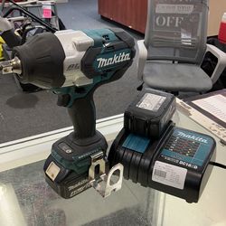 Makita 1/2 inch cordless impact with 2 batteries and charger