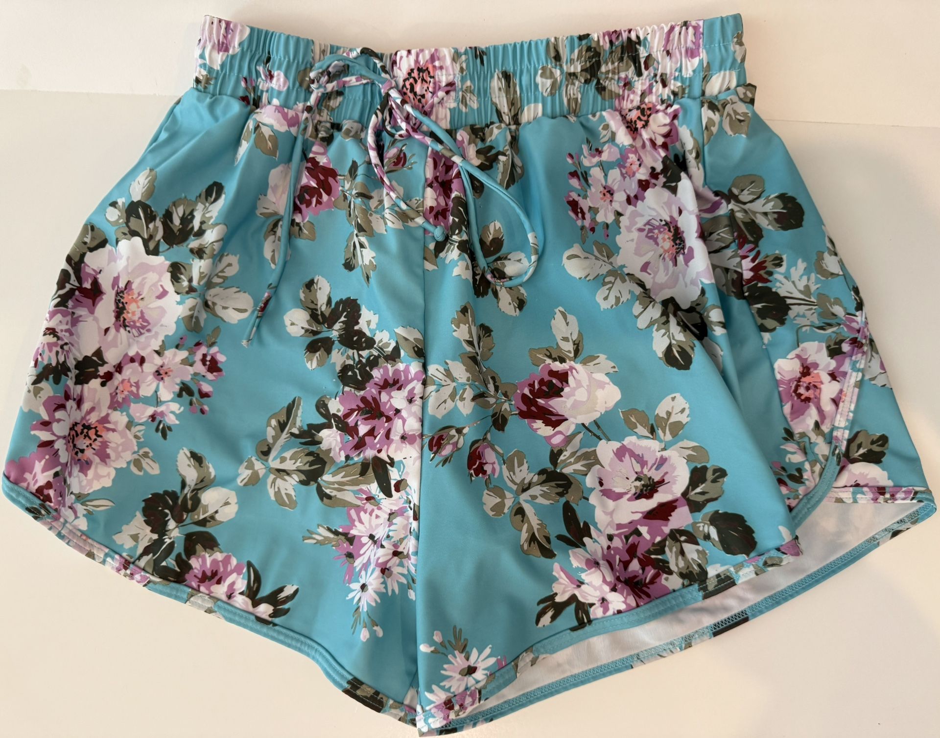 Teal flower women’s swim bottom shorts with an elastic marist & a tie Sz W XL