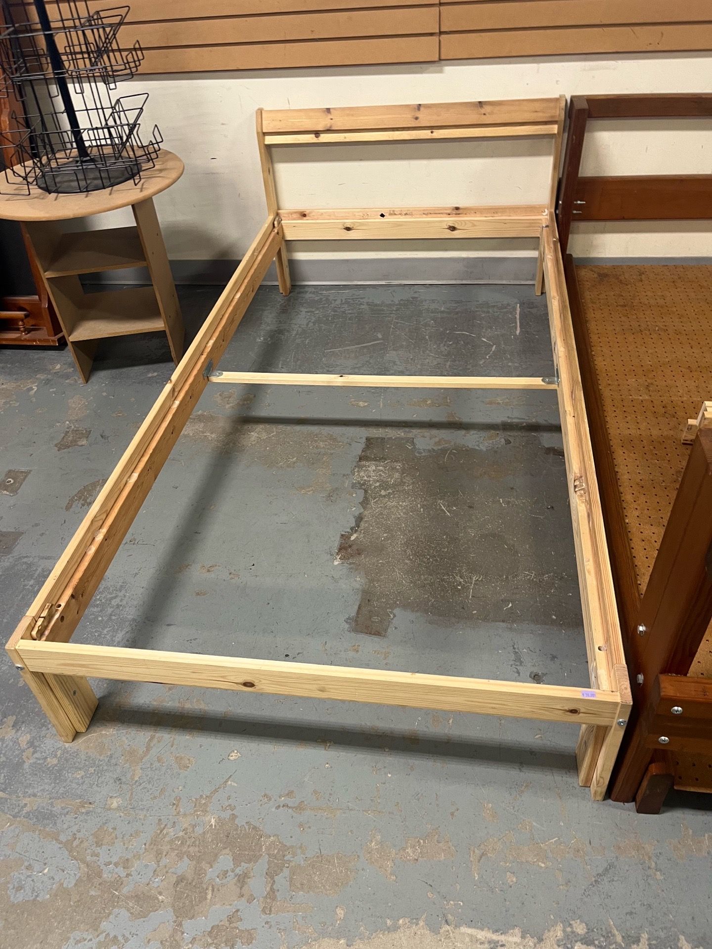 Small wood twin bed frame (in store)