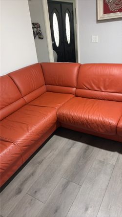 Leather sectional with sofa bed.