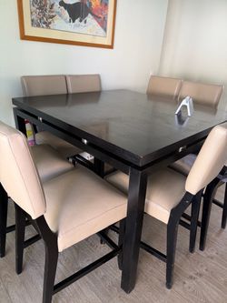 Dark wood counter height table set