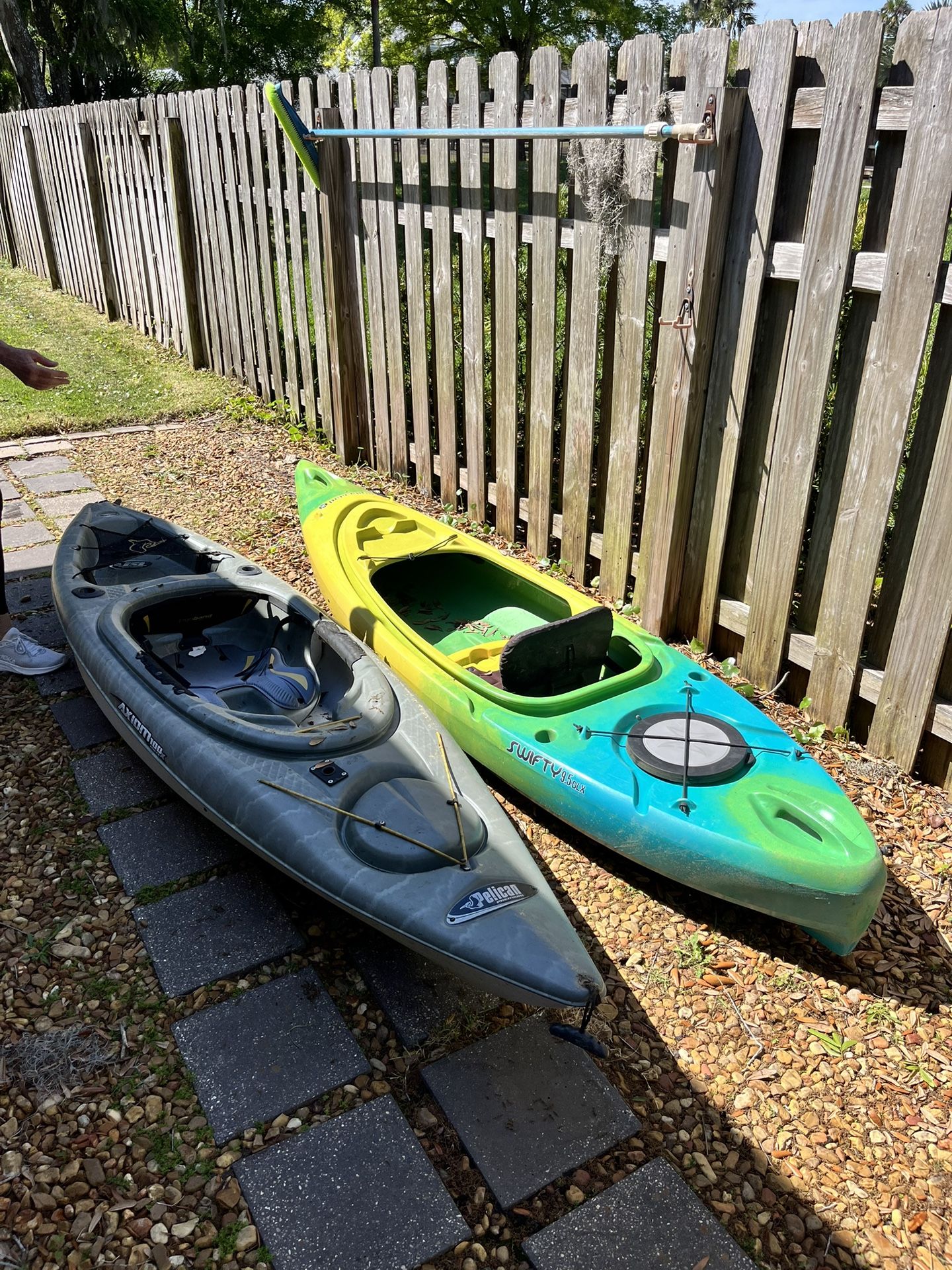 Two Kayaks With Paddles