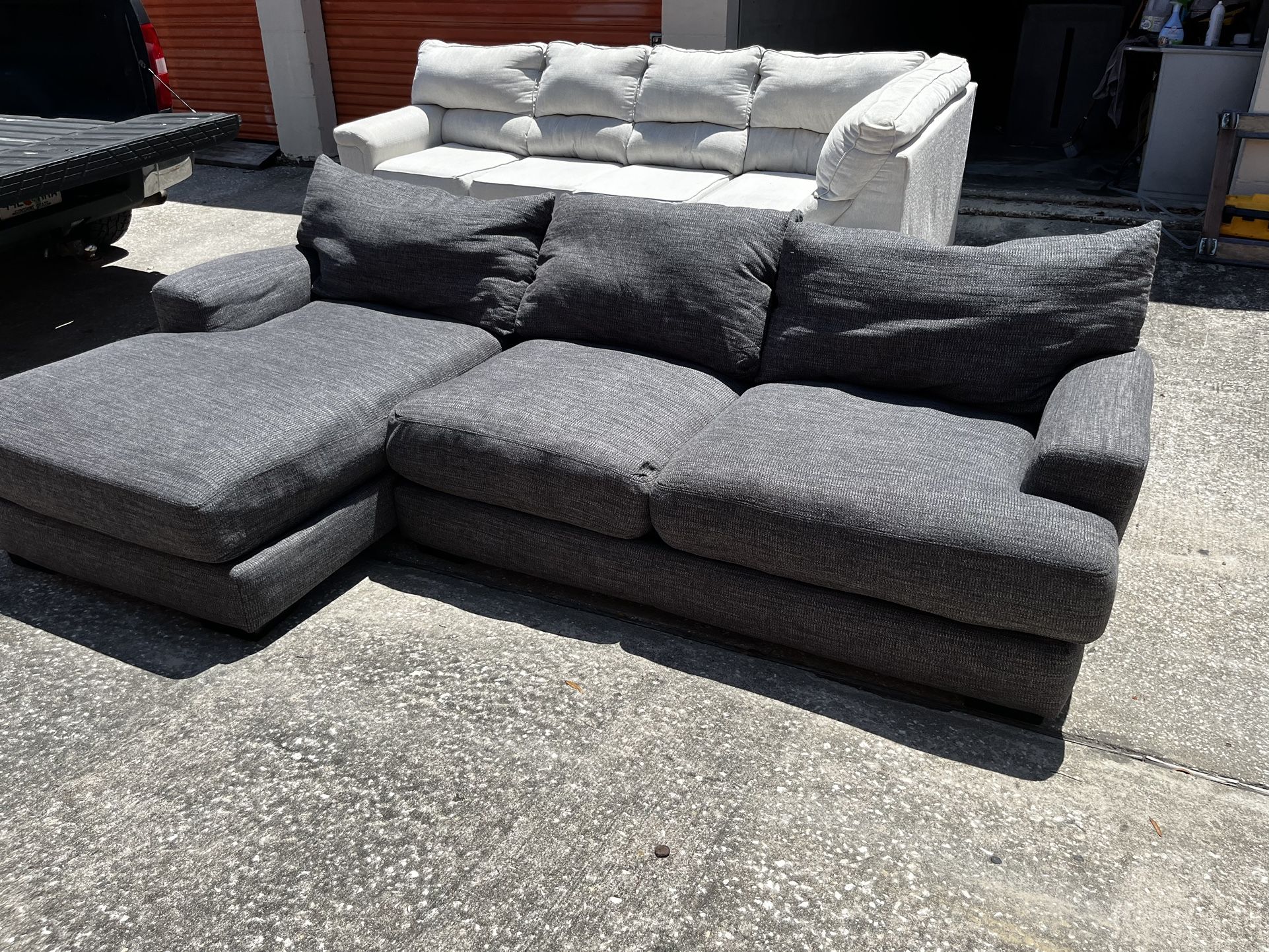 Gray Sectional Sofa from Badcock. Delivery available!
