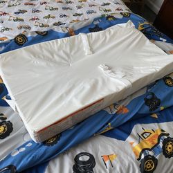 Diaper Changing Pad + a flower shaped pad 