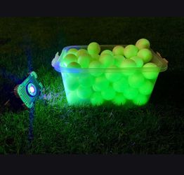 80 Glow In The Dark Golf Balls With Portable Blacklight.
