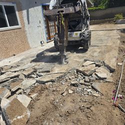 Bobcat Lowboys Dumpsters Brraker