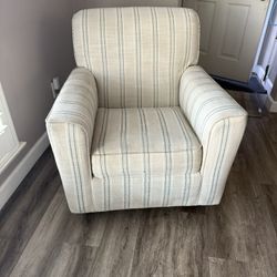 Ashley’s swivel rocking chair 