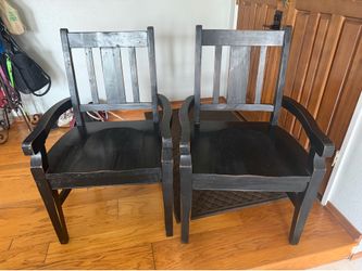Two black chairs solid wood