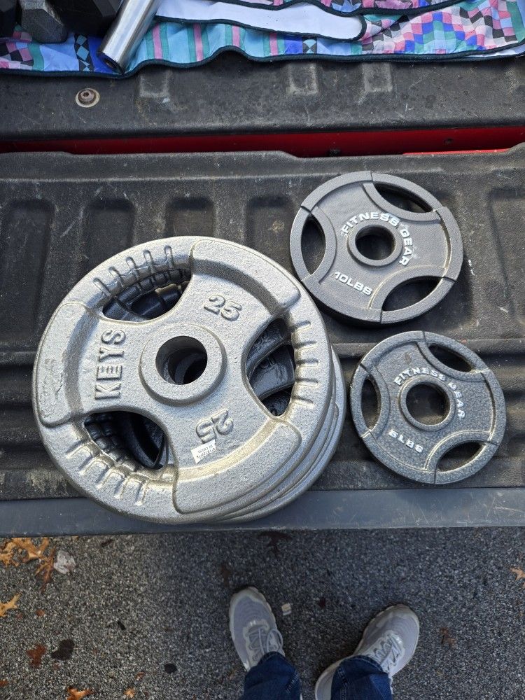 125 Lbs Of Like New Olympic 2" Weight Plates. "CHECK OUT MY PAGE FOR MORE DEALS "