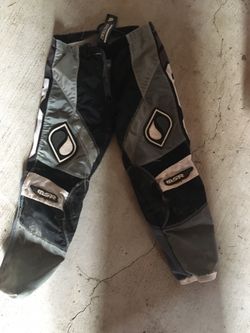Motocross boots, pants, gloves and shin guards