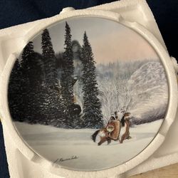 Ruslan and Ludmilla and Julie Kramer Cole collector plates. 