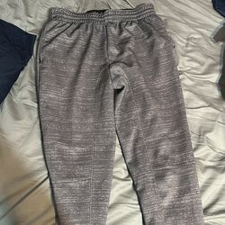 Gray sweatpants with zippers