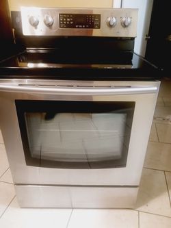 estufa Samsung Stainlees Steel limpia todo trabaja con garantía $ 370