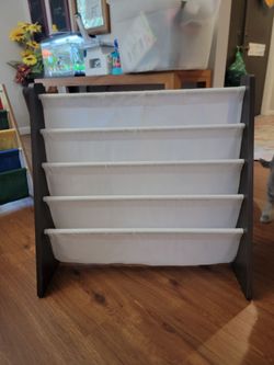 White clothe bookshelf