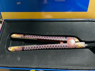 Martino Cartier by Amika limited edition ceramic hair styler featuring an Egyptian-themed design