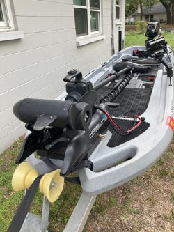 Ascend tournament 133x fishing kayak with Coleman outboard trailer