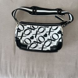 XOXO Mini purse 9x5 . In good condition. Great to put make up in.