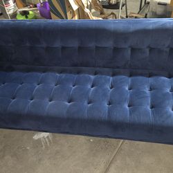 2 blue velvet couches