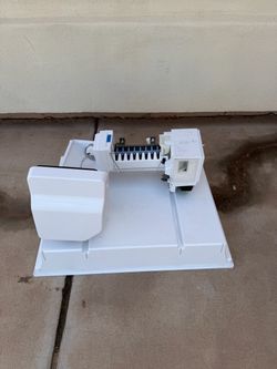 Whirlpool ice maker and auger