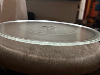 Rotating glass plate for microwave
