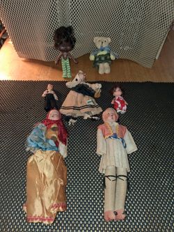 Very old dolls and also clothing for dolls. Selling is a bundle. All sales final.