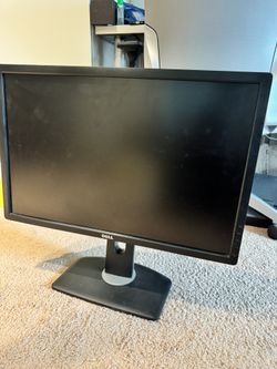 2 Dell 24 Inch Monitors 