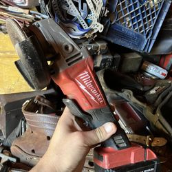 Milwaukee M1 18 fuel grinder with five amp battery