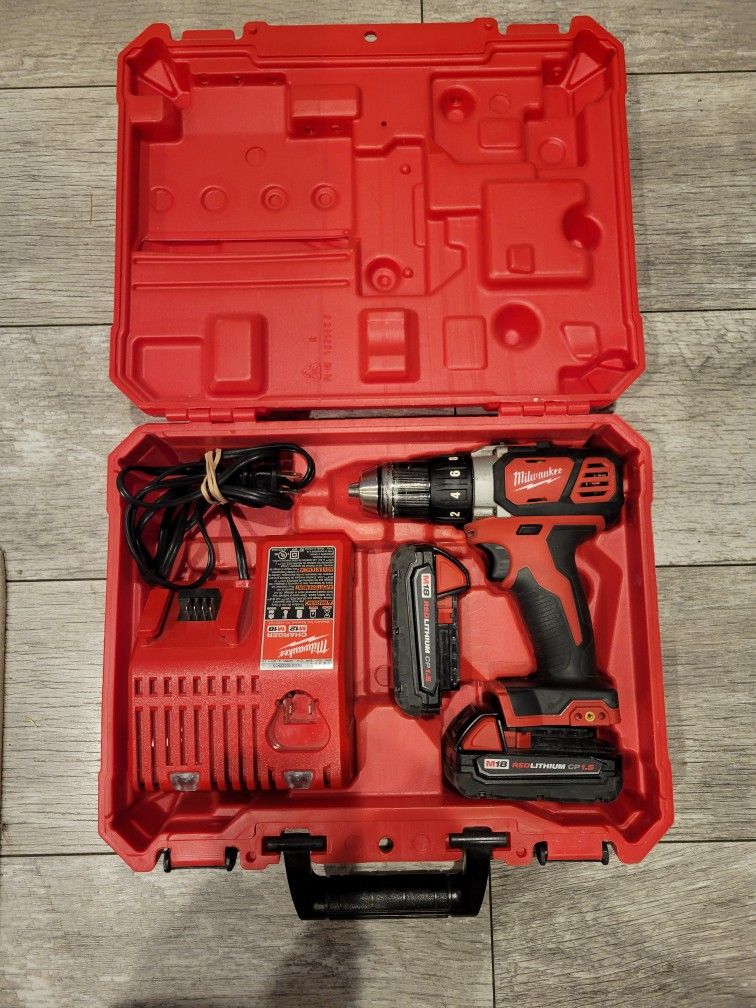 Milwaukee M18 V18 Drill, Charger Case And Two Batteries