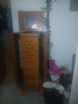 Oak standing seven drawer jewelry box armoire