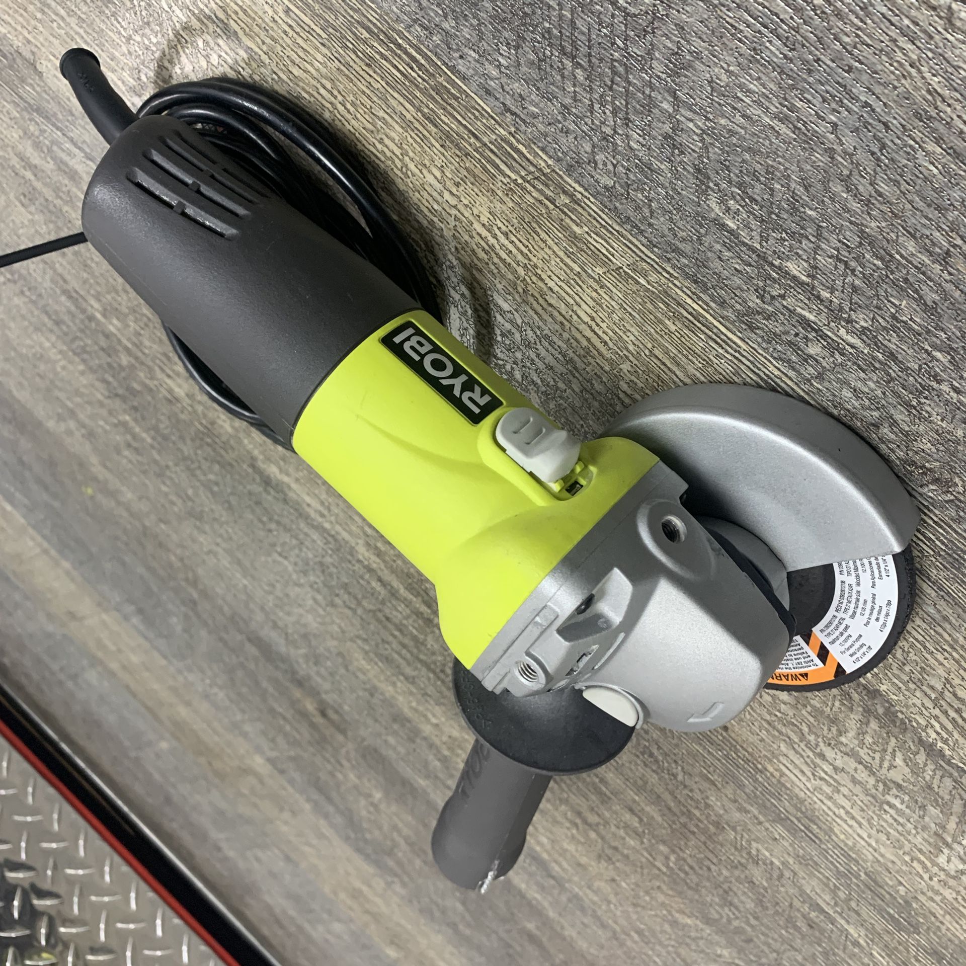 ryobi angle grinder. New out the box. With grinding wheel