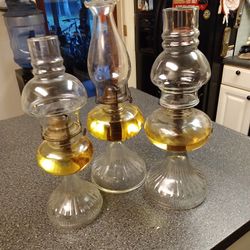 3   OIL LAMPS OVER 100 YEARS OLD  WICKS TREADS INSIDE GLASS NOT OVER LIKE CHEAP ONES. 225.00.  OBO