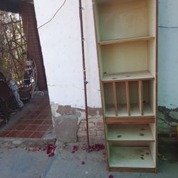 Bookshelf With Ceramic Animal Trinkets 