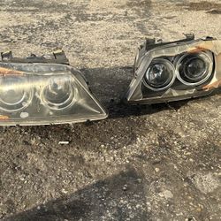 bmw e90 damaged oem headlight 