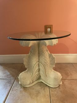 Round Glass Table With 3 Fish Sculptures $30