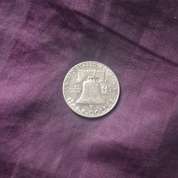 Half dollars and a couple walking liberty.