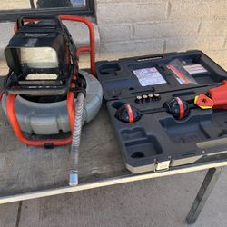 Rigid sewer, camera, and locator