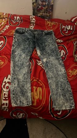 Blue acid-wash denim jeans