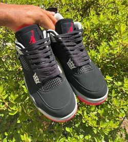 Size 10 and 8/5 and 12 available Air Jordan 4 Retro Bred Sneakers