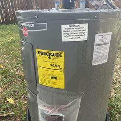 Rheem electric water heater near new condition
