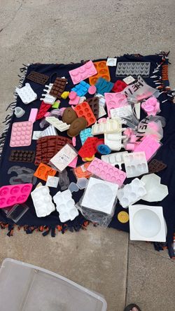 A bunch of different cake and chocolate molds