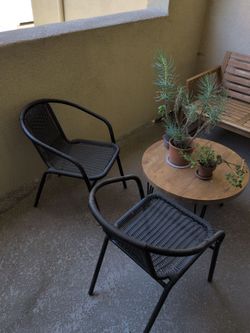 2 rattan/metal outdoor chairs