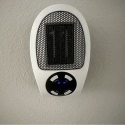 Portable plug in Sharper Picture Image Heater