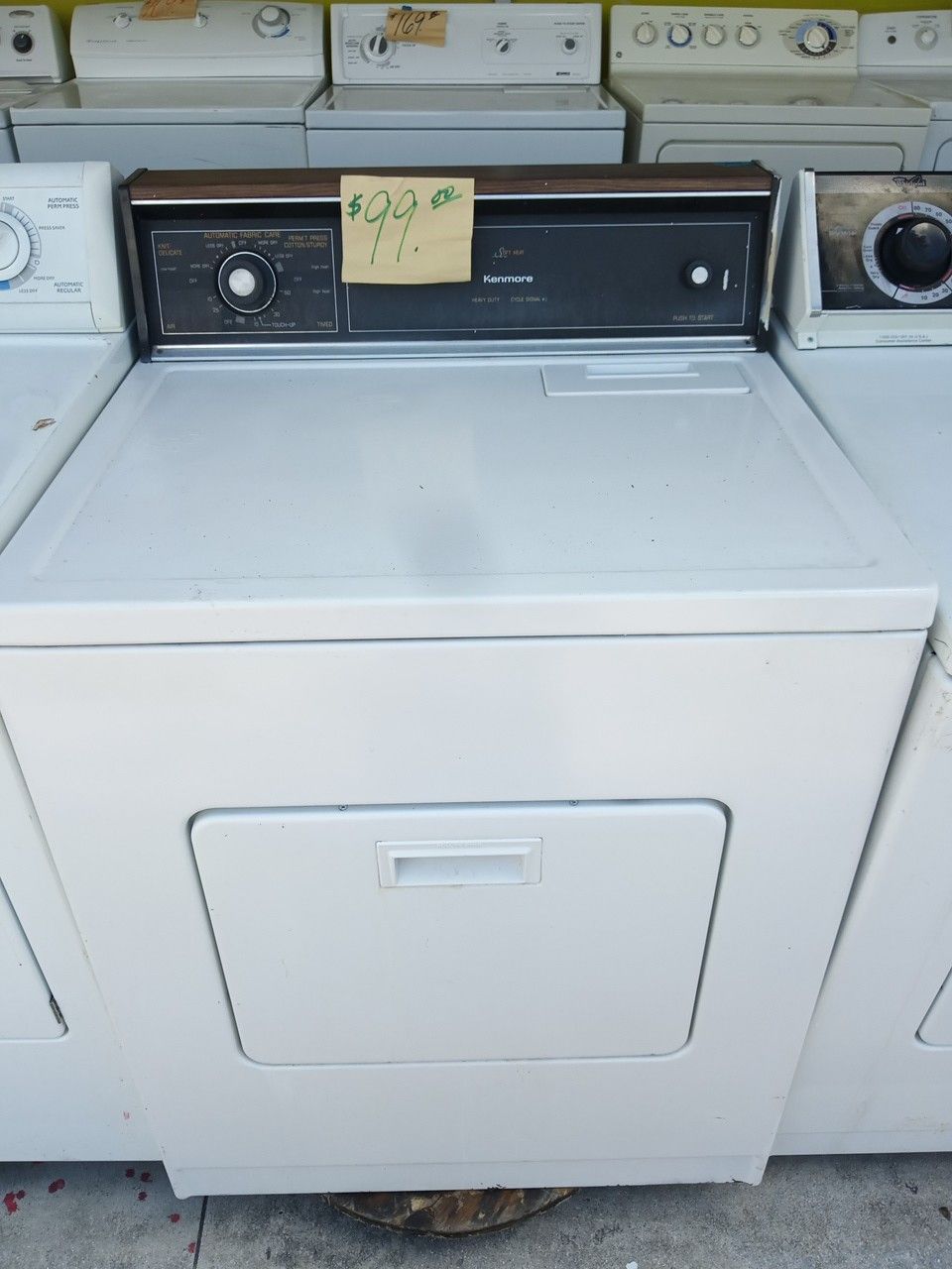 Kenmore Dryer white heavy duty large works great . Warranty . Delivery available . 2203 Fowler st. Ft. Myers 33901