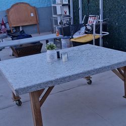 Granite table with oak legs and wheels