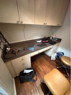 desk and overhead cabinet