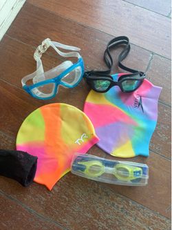 Three swimming goggles and two swimming caps, a total of 10 dollars.